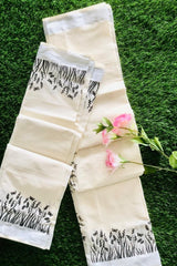 Elegant Cotton Set Mundu with Silver Border and Black Leaf Print