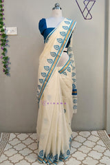 Stunning Blue-Bordered Cotton Set Saree With Traditional Leaf Prints