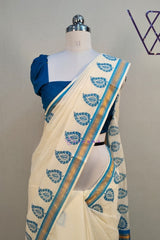 Stunning Blue-Bordered Cotton Set Saree With Traditional Leaf Prints