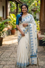 Stunning Blue-Bordered Cotton Set Saree With Traditional Leaf Prints