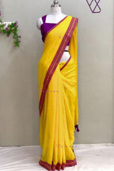 Bright Yellow Mul Cotton Saree with Purple and Golden zari Border