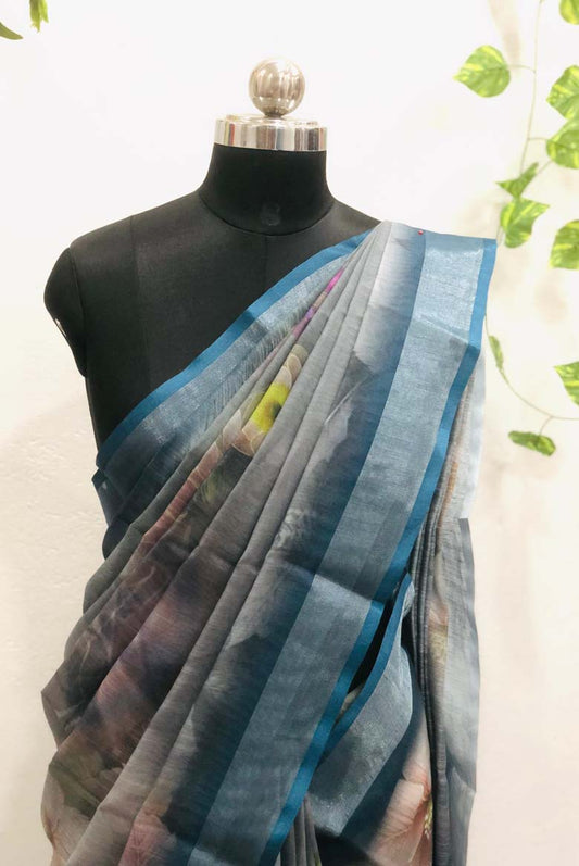 Linen-cotton blend saree with a 3D digital print, comes with an unstitched running blouse piece. (Color-Grey)